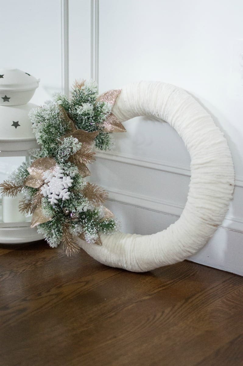 yarn wrapped DIY Christmas wreath with embellishments