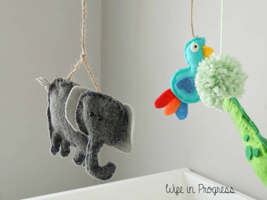 Our baby boy's nursery crib mobile has a little baby elephant and bird