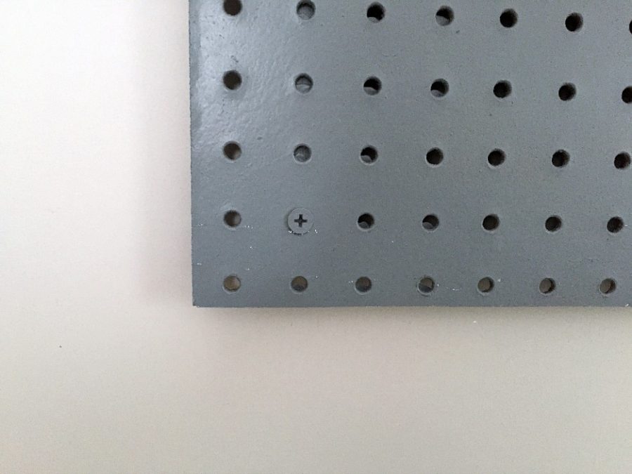 screw pegboard to wall