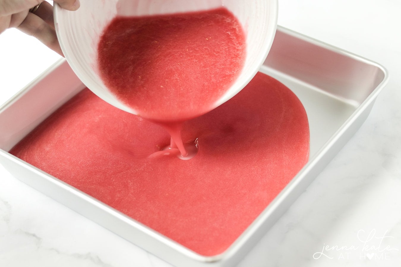 Pouring the sorbet mix into a metal pan