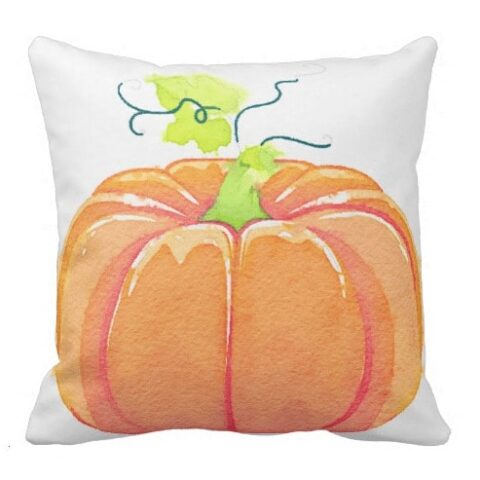 Square, white pillow with a full-size graphic of a large pumpkin