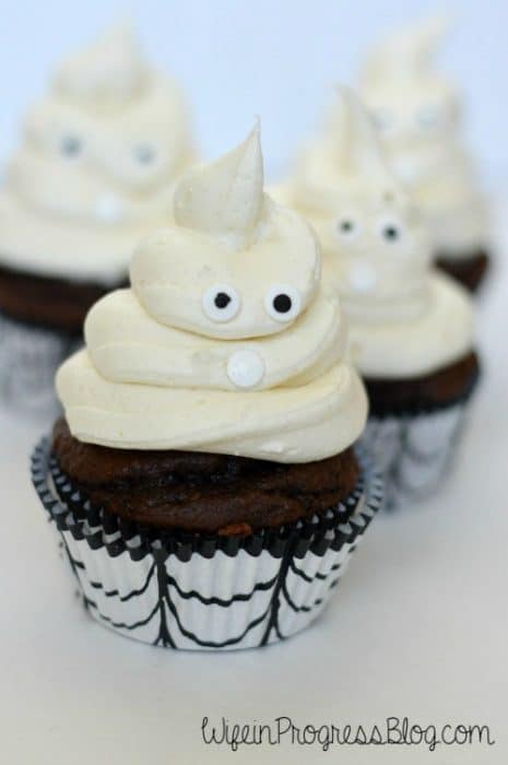 Edible pearls make the eyes and mouth of these spooky Halloween ghost cupcakes