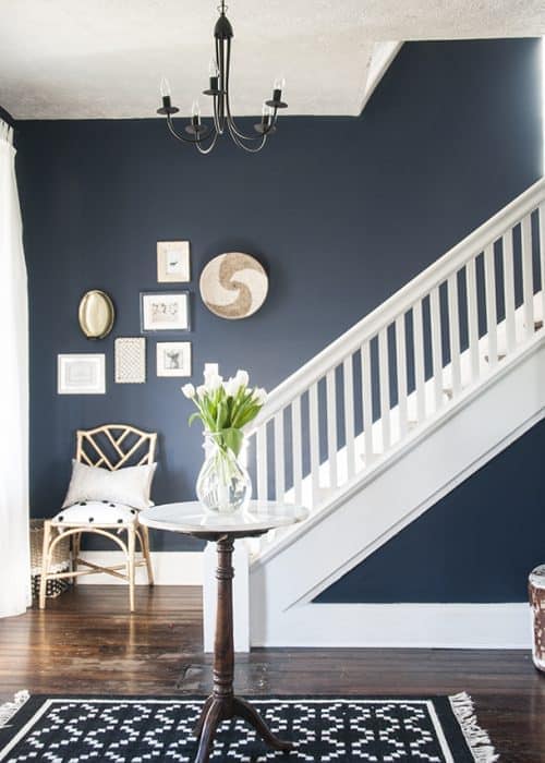 Naval entryway with white staircase