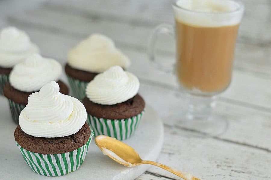 These Irish Coffee Cupcakes are perfect for St. Patrick's Day! Rich chocolate stout cupcakes topped with fresh whipped cream