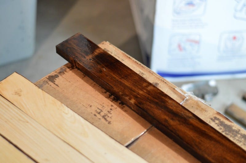 Staining the wood dark walnut.