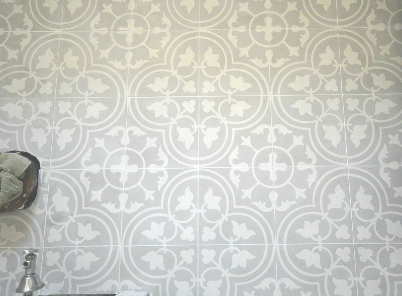 Gray cement tile floor in bathroom