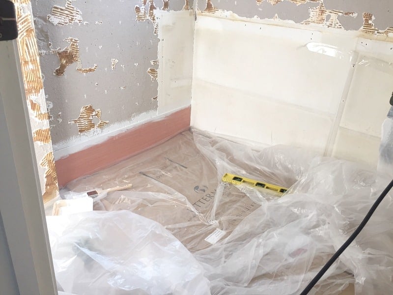 Installing plywood shiplap on the bathroom wall