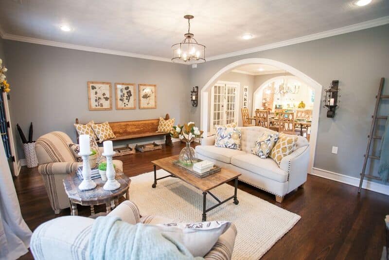 Neutral couch in a fixer upper style living room