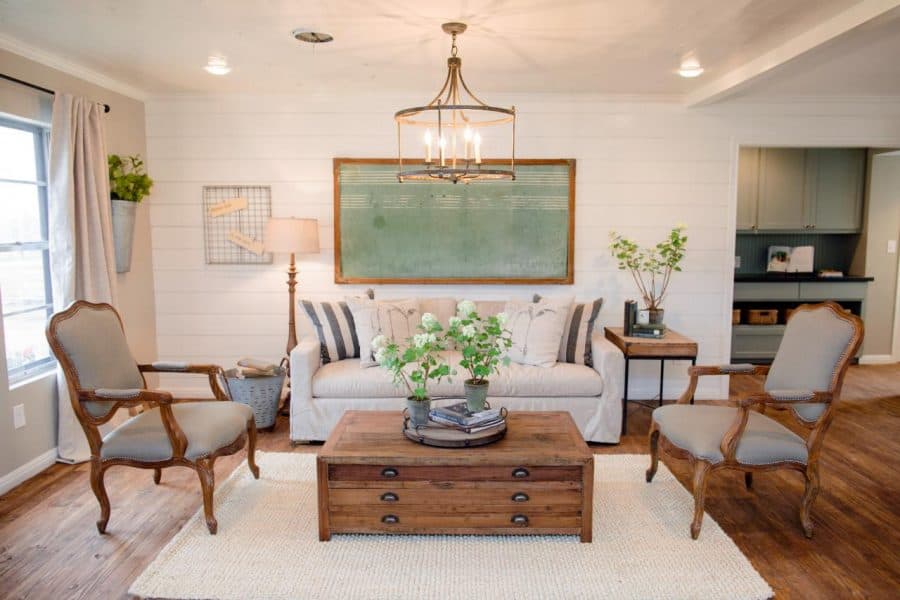 Rustic coffee table and cream rug for the fixer upper look