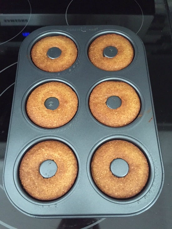 A donut baking pan with 6 baked donut rings