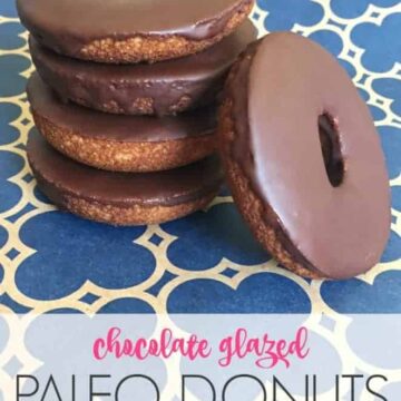 Chocolate glazed paleo donuts - a stack of donuts on a blue mat