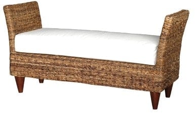 Brown wicker bench with thick white cushion for seating