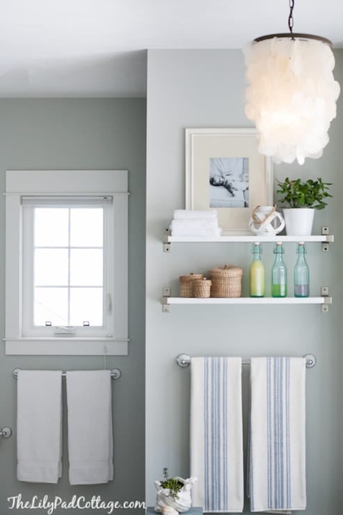 Artic Gray bathroom walls with white floating shelves