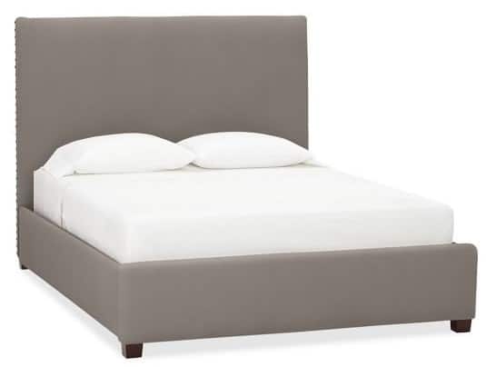 Raleigh bed in Gun Metal Gray from Pottery Barn with a tall, upholstered headboard