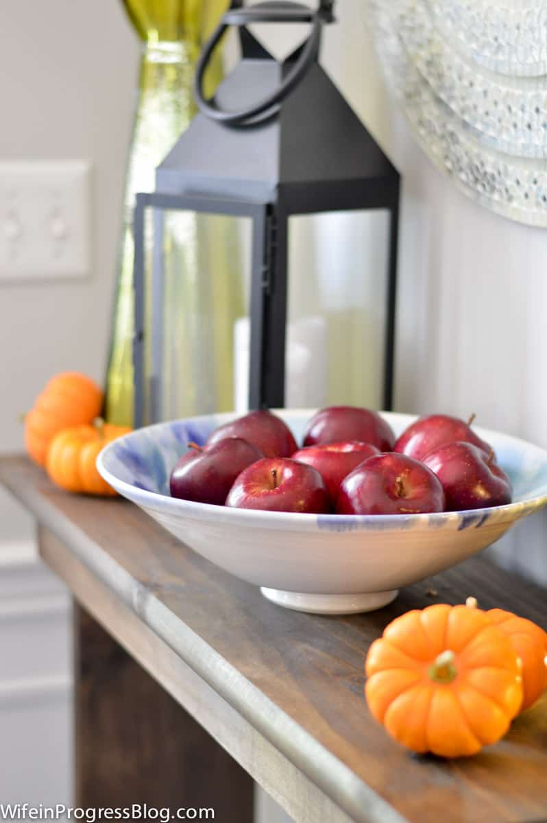 A bowl filled with red apples