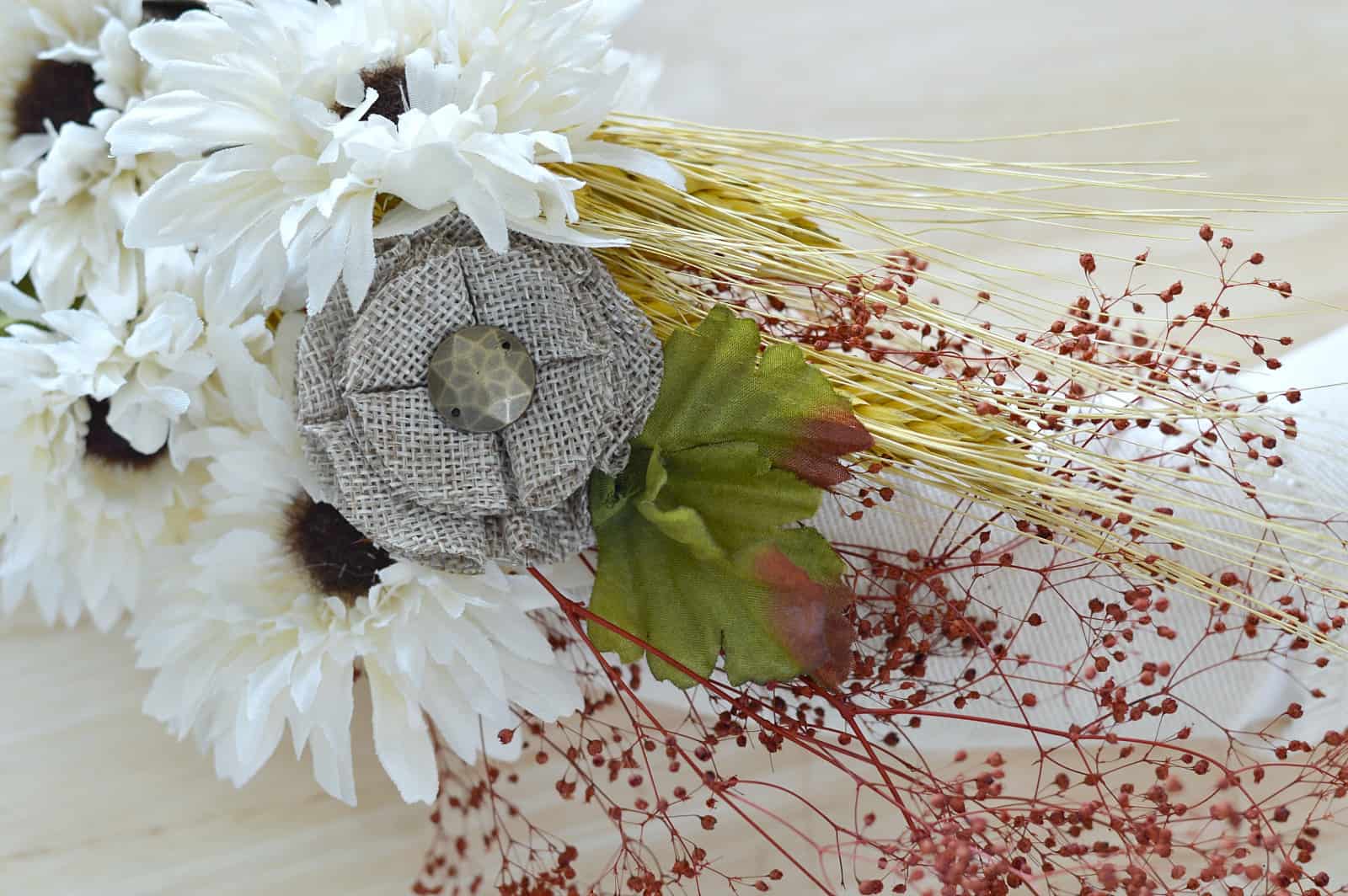 close up of the burlap flower attached to the wreath