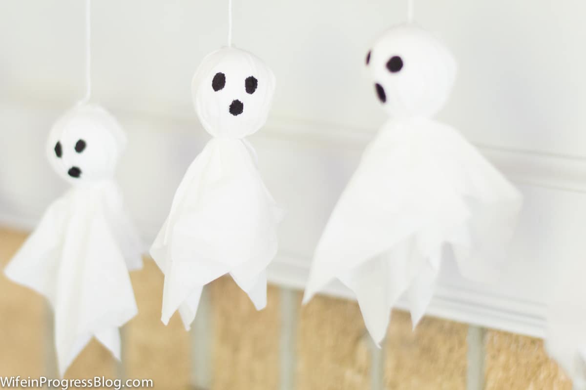 A few tissue ghosts hanging from the fireplace mantel