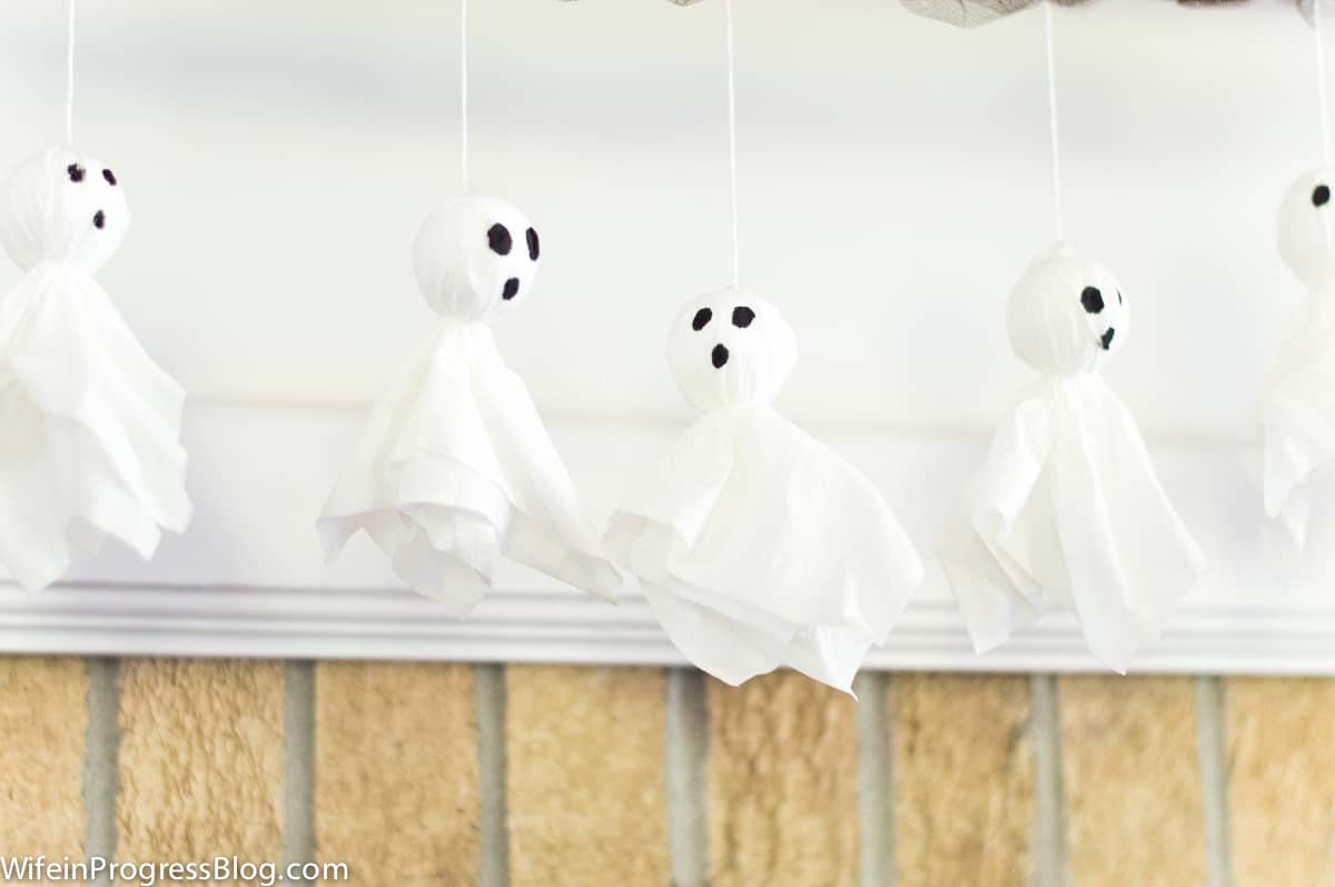 A few tissue ghosts hanging from the tulle garland