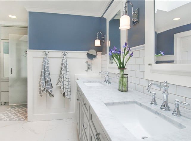 Coastal style bathroom with white wainscoting and Sherwin Williams Storm Cloud walls