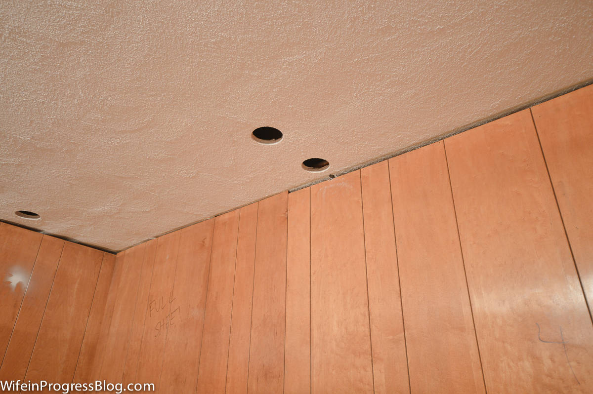 Two holes in the ceiling to allow electrical wires in