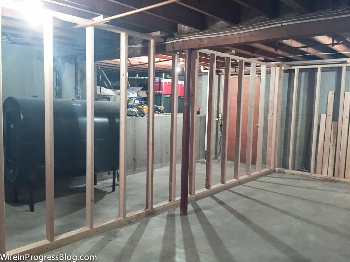 Wooden frames forming a wall to partition the basement 
