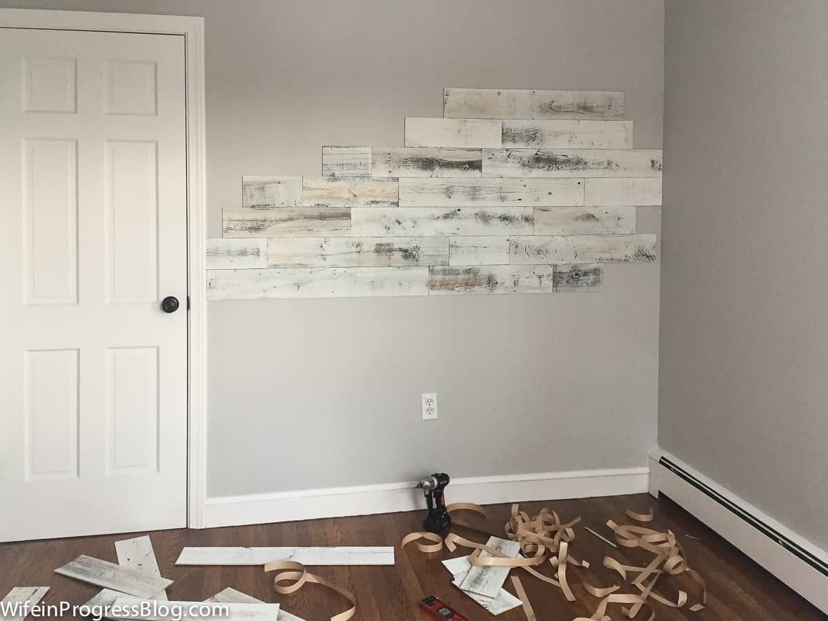 Reclaimed wood wall planks on wall near closet