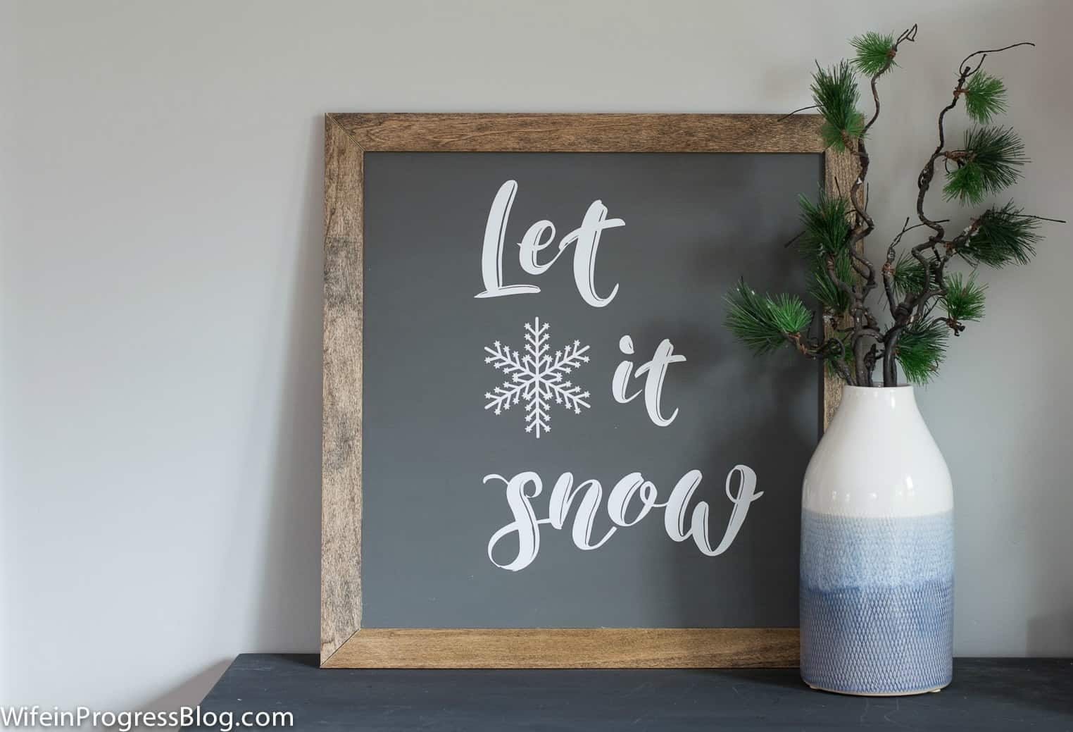 This DIY farmhouse style sign is the perfect Christmas decor! Switch up the words or phrase to fit any time of the year