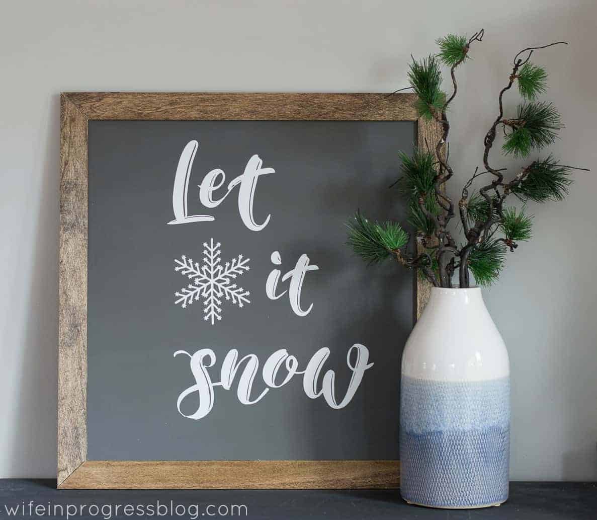 This Let it Snow farmhouse style sign is simple DIY Christmas decor that you can use for years to come!