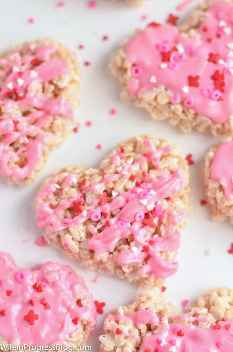 Hearts drizzled with pink candy melts and Valentine's sprinkles