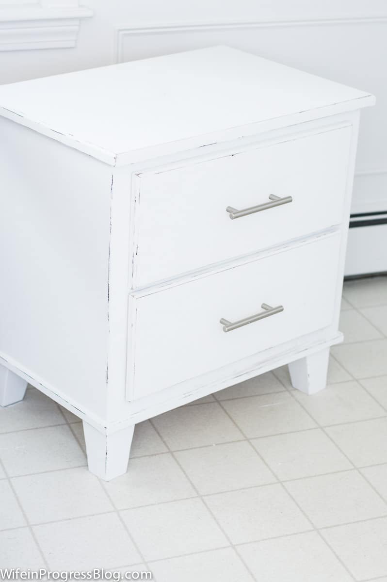 The completed nightstand, painted and distressed with sand paper, now with hardware reattached.