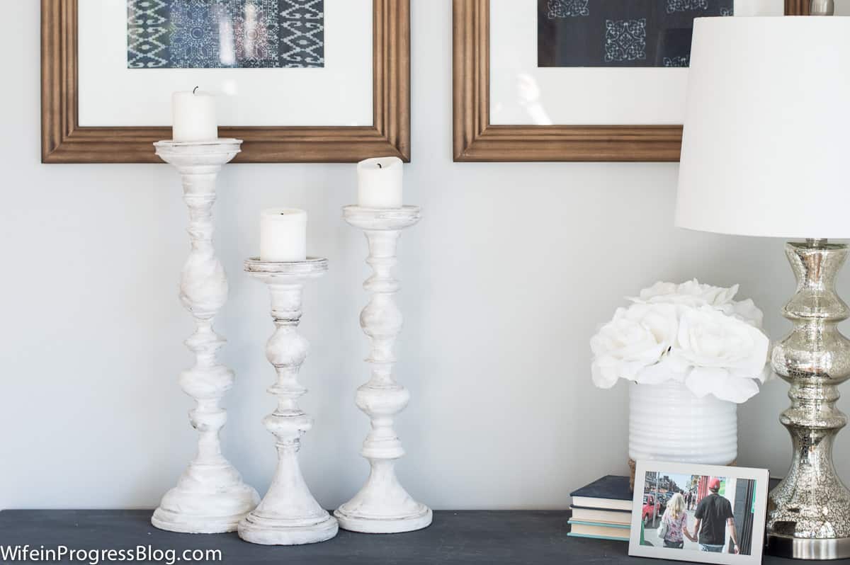 With a few simple coats of DIY white chalk paint, these candlesticks look like vintage finds!