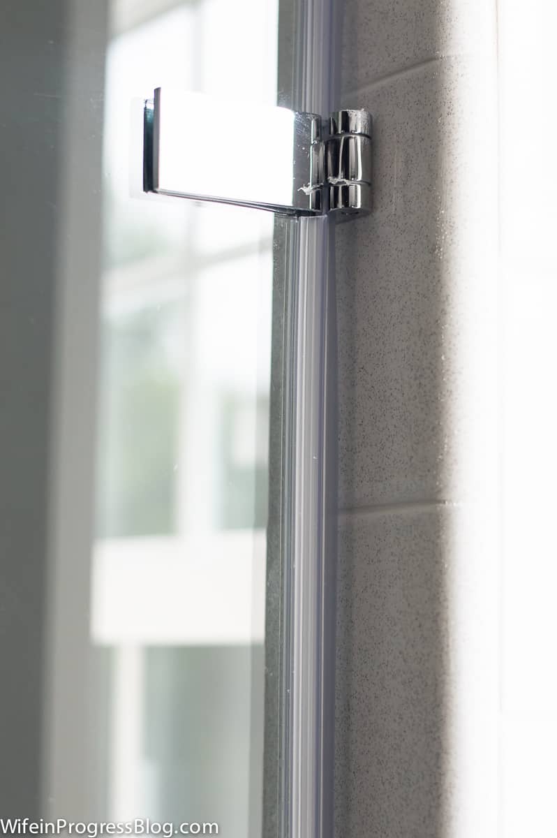 The heavy-duty anchor hinges for this single pane glass shower door are chrome finish to match our other master bathroom fixtures