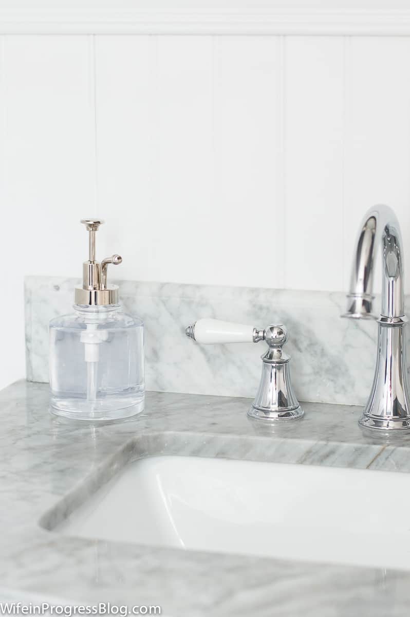 I love this grey and white marble vanity top because it lightens up the room with a sleek look