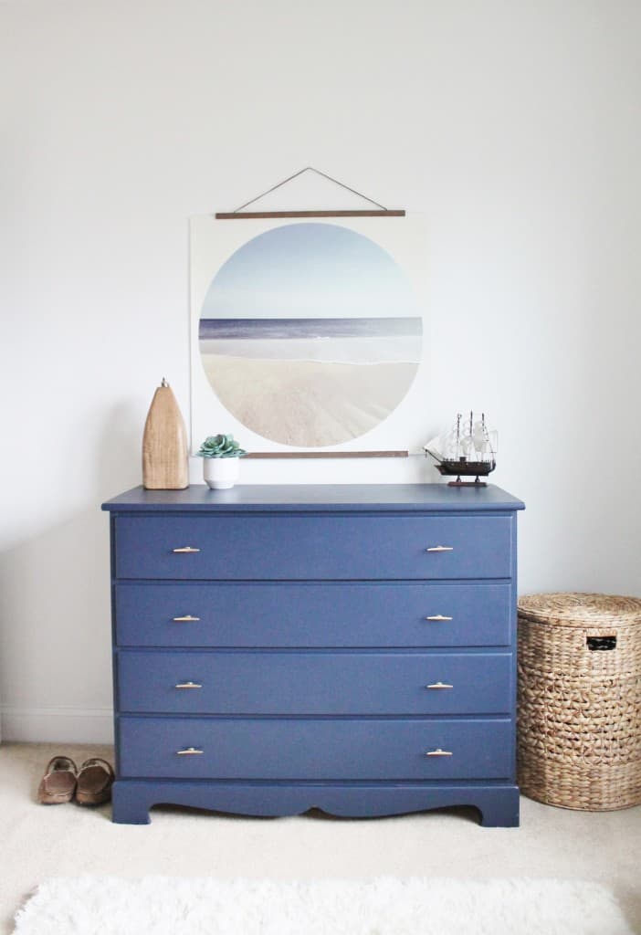 A dresser painted with Naval by Sherwin Williams. Such a pretty shade of blue!