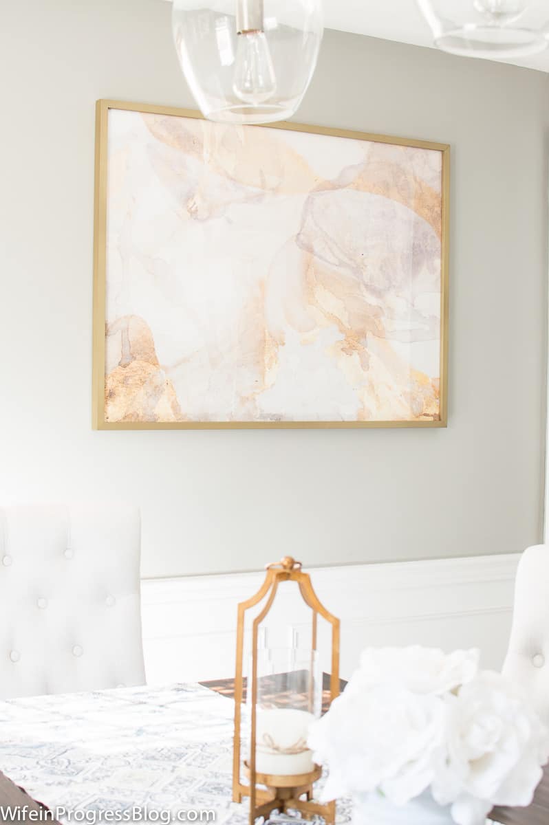A beautiful neutral dining room makeover with gold accents