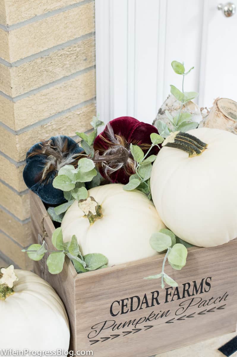Mostly Mauve Fall Home Tour - add pumpkins to a crate