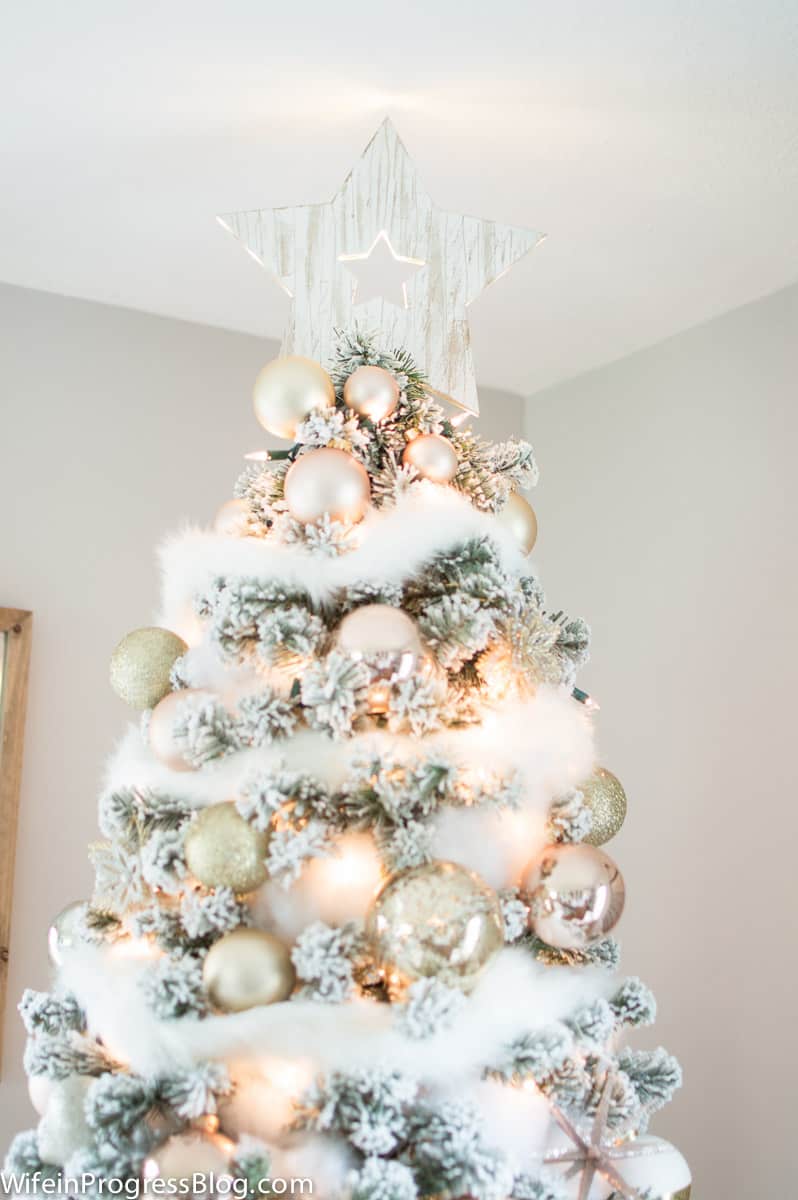Use polyster pillow stuffing to add a soft faux snow trim effect on a Christmas tree