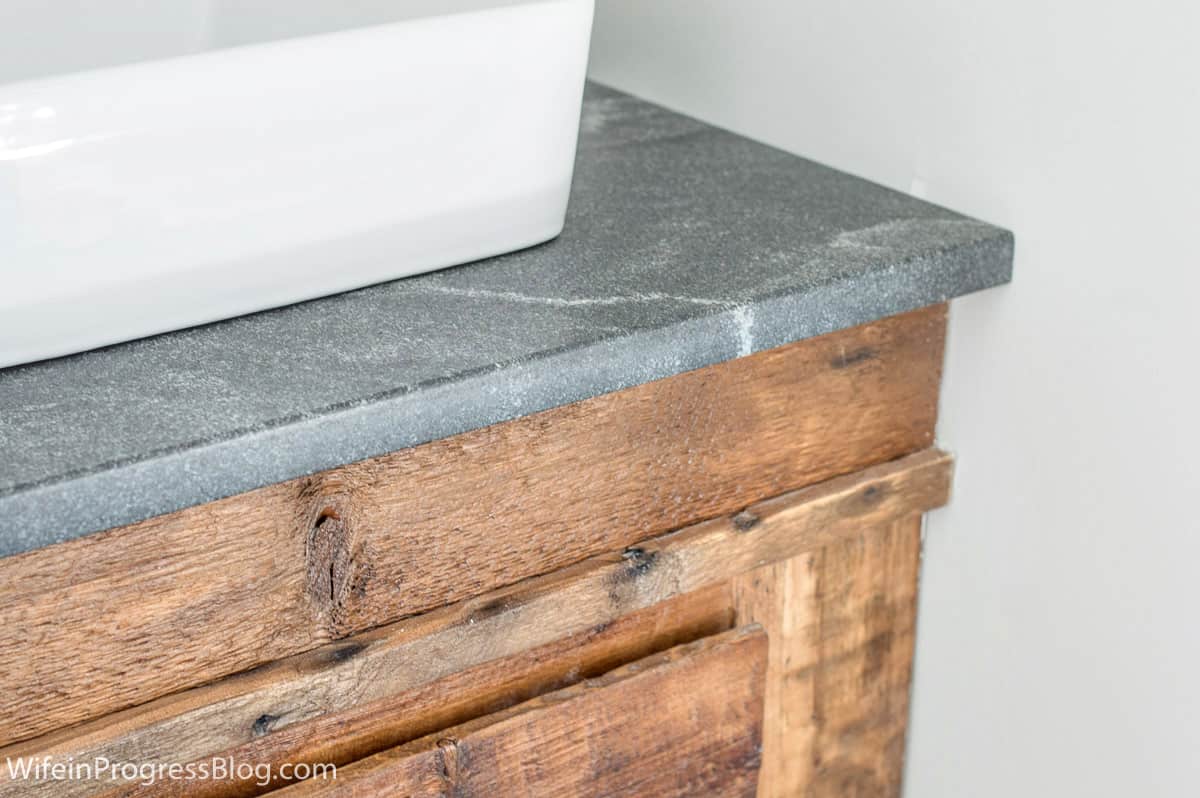 Granite, "Jet Mist" in a modern farmhouse bathroom remodel