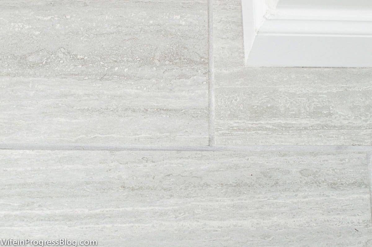 Close-up of simple gray tile in a farmhouse style bathroom