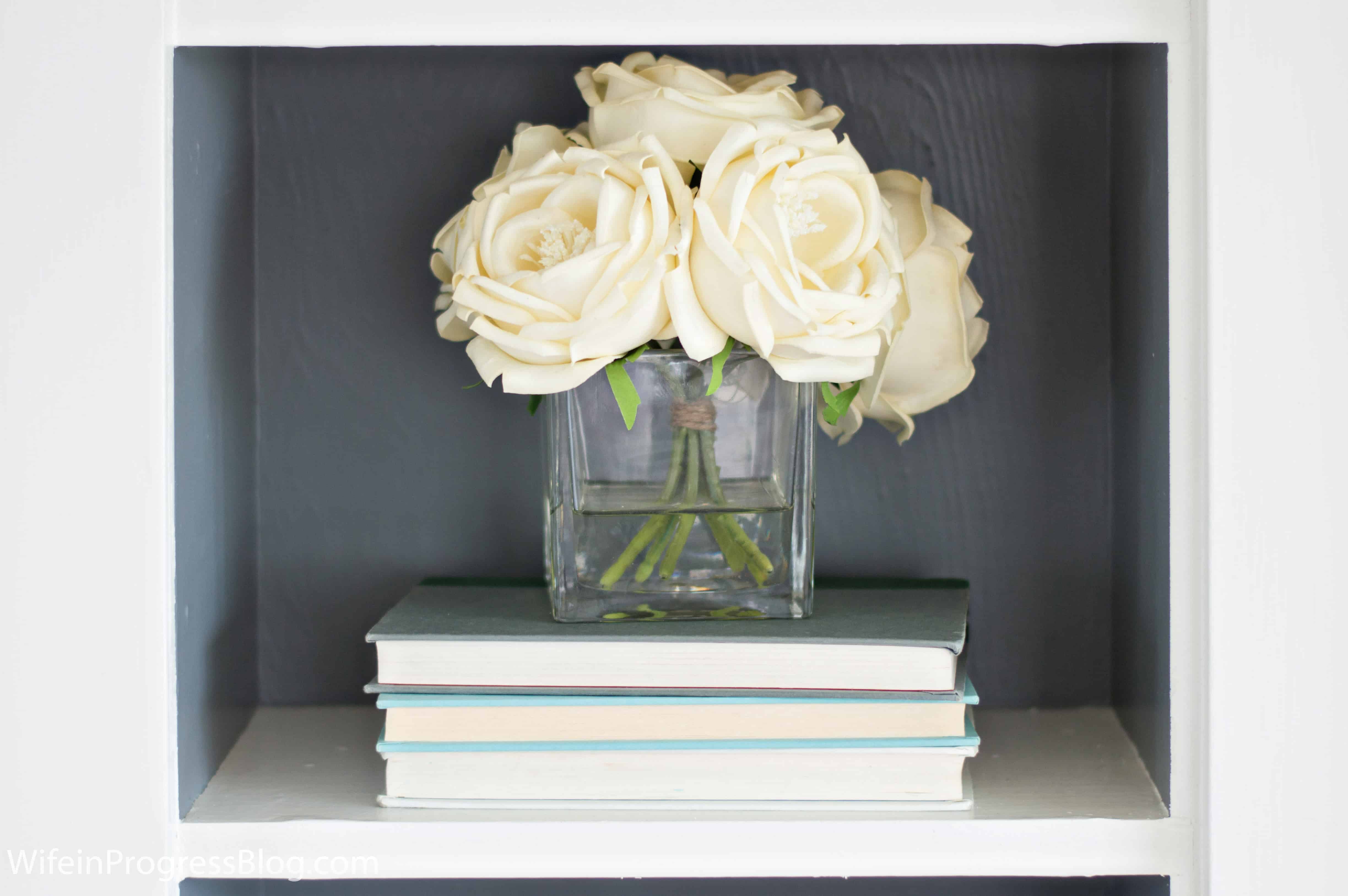 Are you adding height to your coffee table or bookshelf styling? If you're not, this might be one of the reasons your efforts never look quite right!