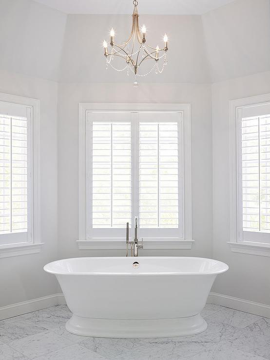 An elegant bathroom painted with Paper White by Benjamin Moore