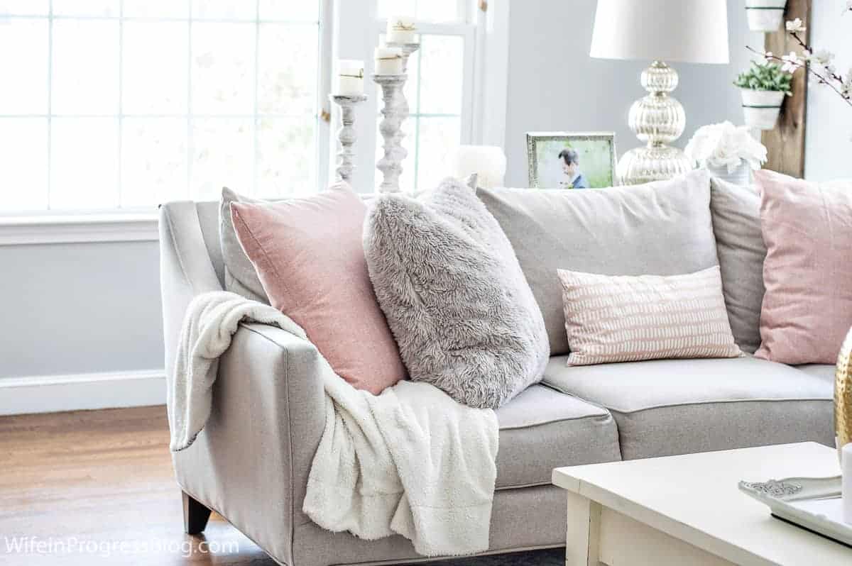 pink and off white living room