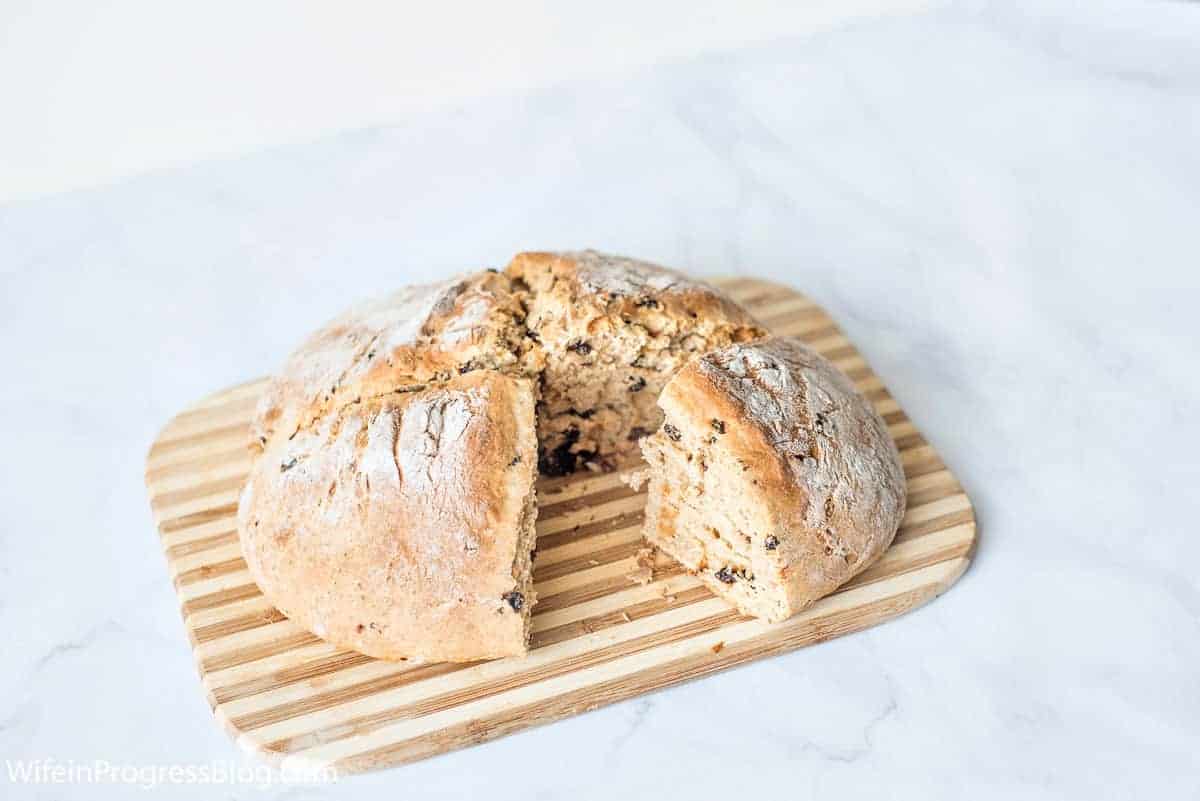 Irish Soda Bread cut open on a bread board