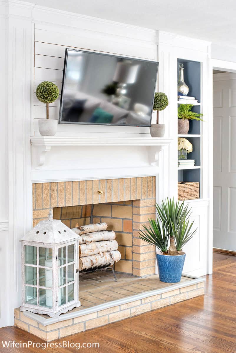 Fireplace with backs of built-ins painted Sherwin Williams Serious Gray