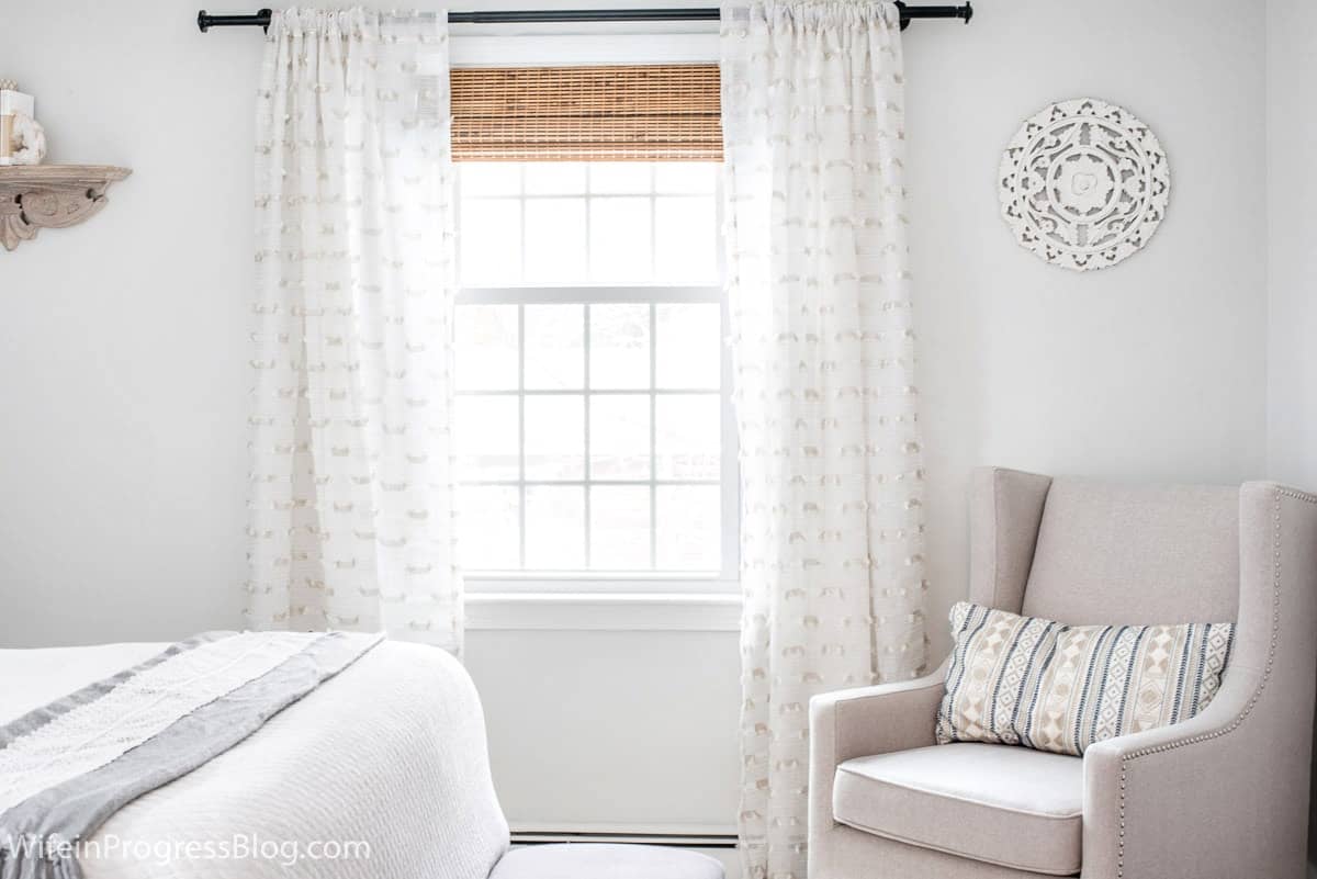 Benjamin Moore Paper White is the perfect paint color for this small master bedroom makeover