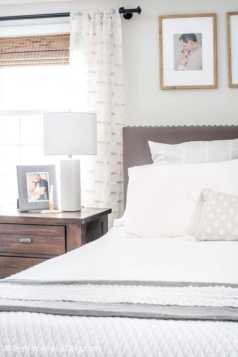 In a small bedroom don't be afraid to put the nightstands in front of the window if it means a more functional space