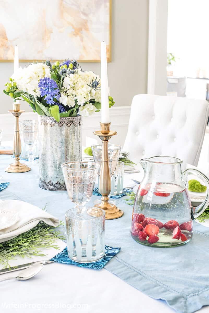 Fruit water with raspberries and strawberries at a spring tablescape dinner party