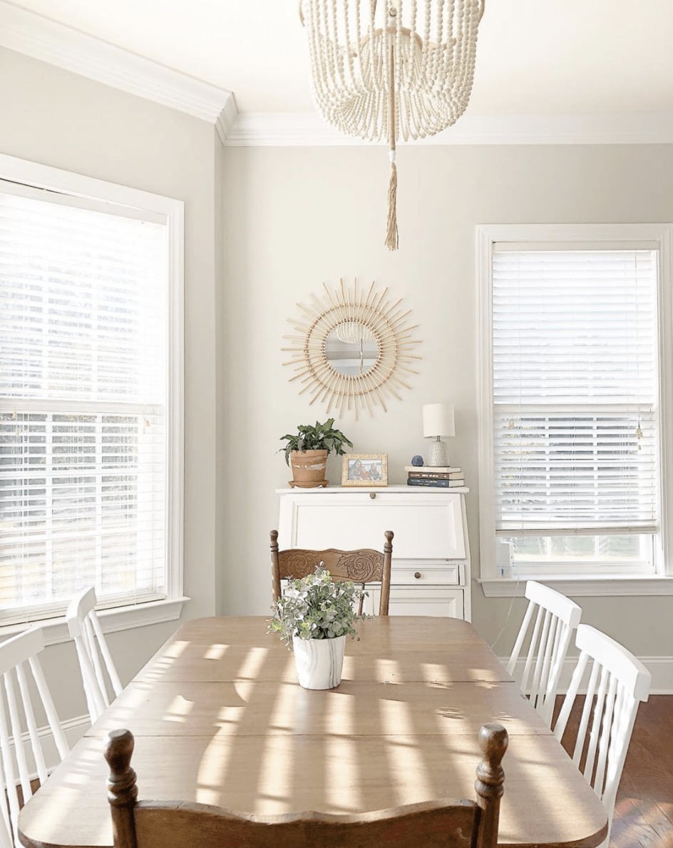 Sun lit dining space shows how much warmth and creaminess can excude from the paint color