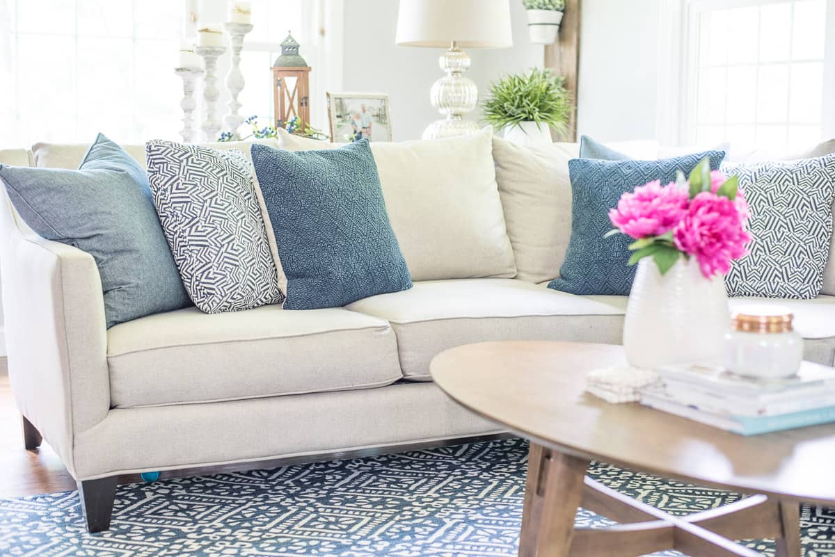 Navy blue and white living room with lots of texture and varying shades of blue.