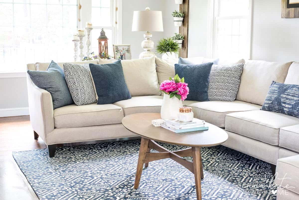 The perfect navy rug for a coastal inspired living room